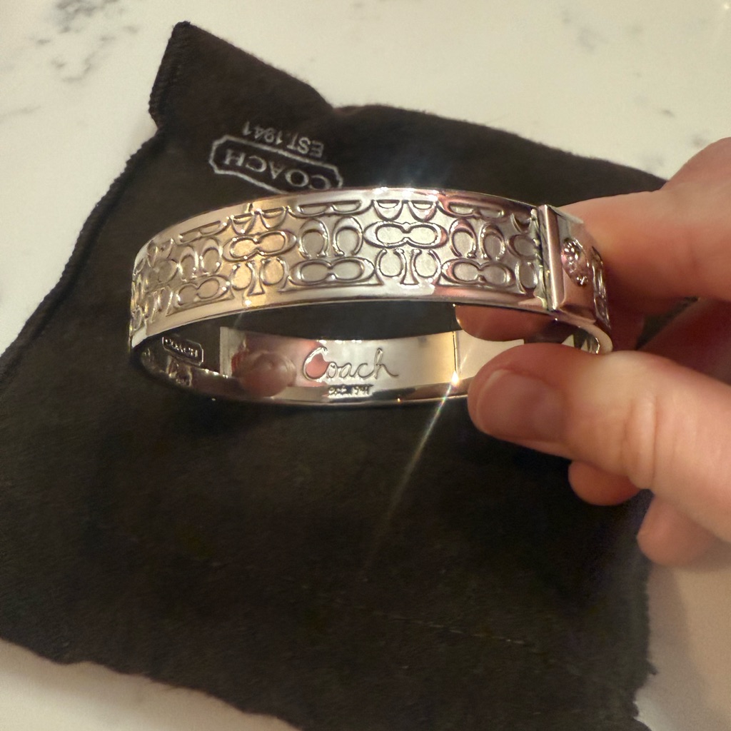 Coach Silver Embossed Bangle 45$